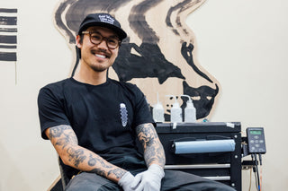 Artist Bryce Wong hanging out in his art studio.