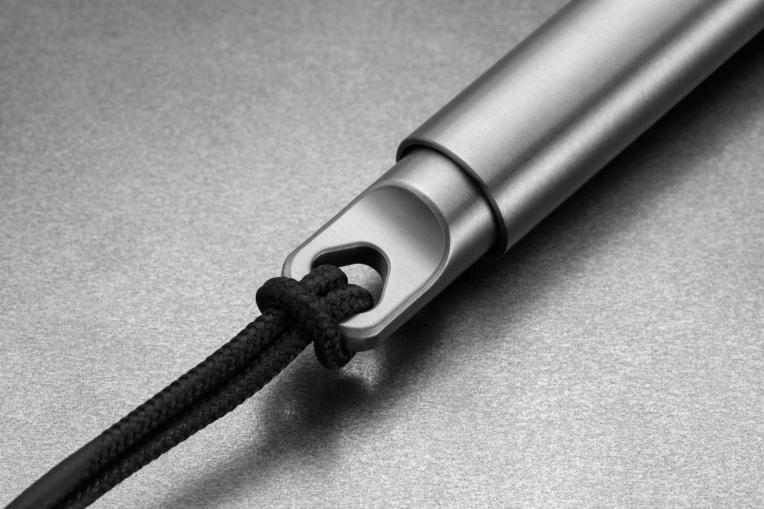 The lanyard attachment of The Stilwell compact travel pen.