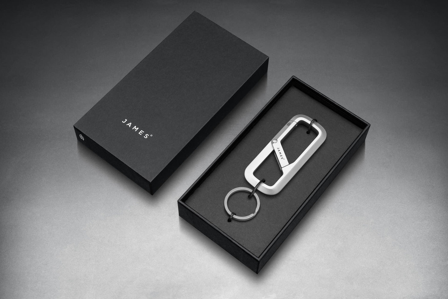 The Madison keychain carabiner in its box.