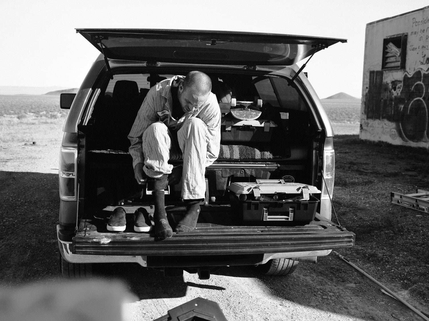 Artist Jess Mudgett preparing to paint a mural.