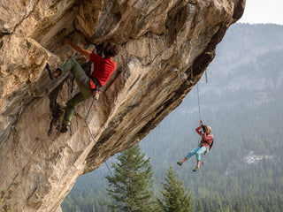 Professional rock climber and photographer Savannah Cummins getting into position for the shot.