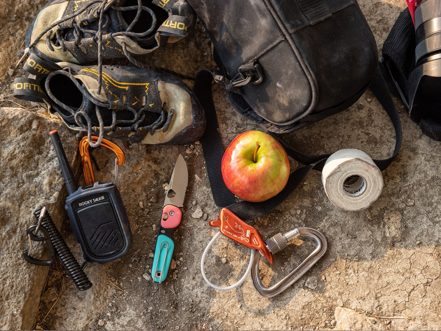 The Redstone folding pocket knife with Savannah Cummin's climbing gear.