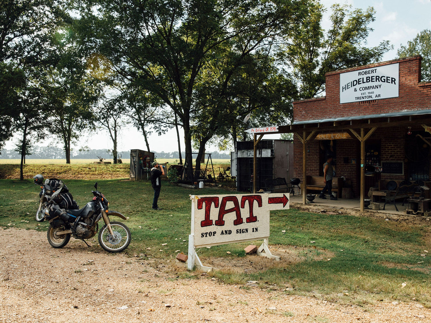 Motorcyclist taking a break at a road side store in Trenton, Arkansas.