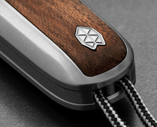 The lanyard attachment of the Pike classic slip joint folding rosewood pocket knife. 