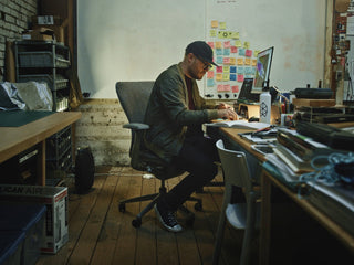 Ryan Coulter, founder of The James Brand, at his desk in Portland, Oregon. 