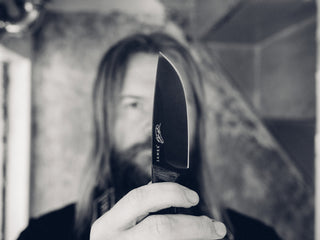 UK artist Schoph Schofield with his artist series Hell Gap fixed blade camping knife.