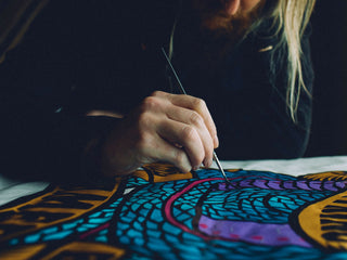 UK artist Schoph Schofield working on a James Brand collaboration poster.