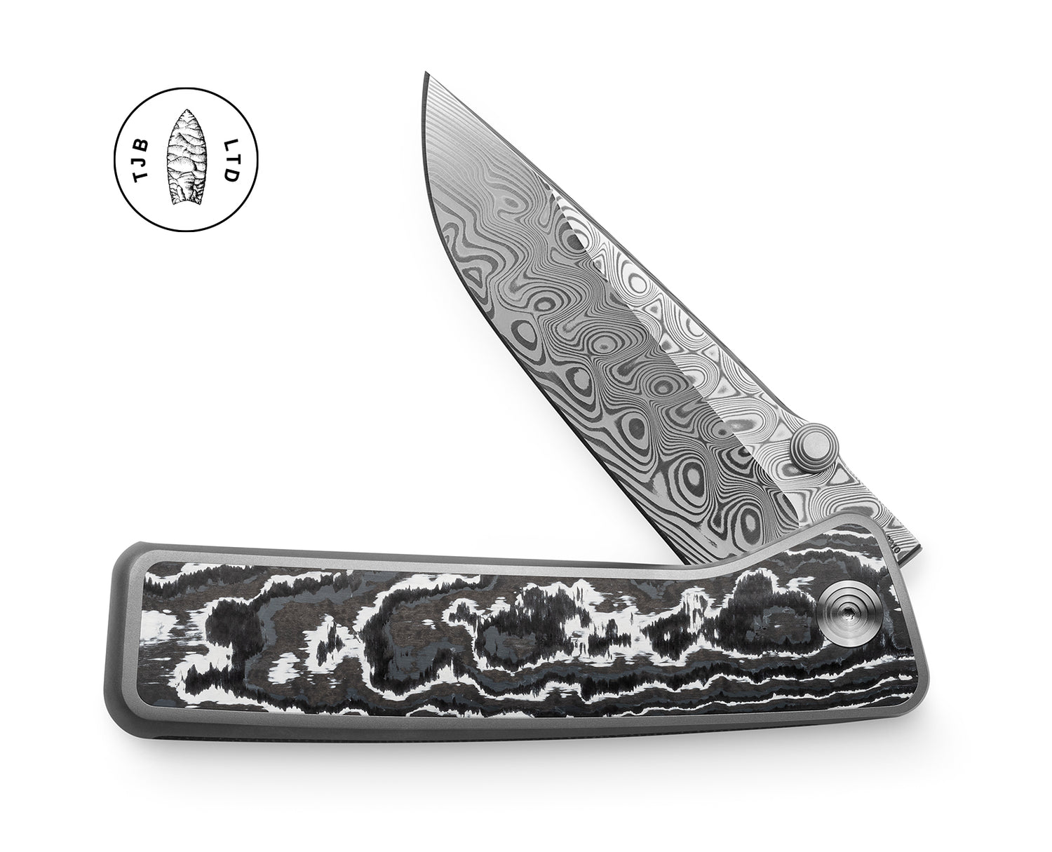 The Barnes integral titanium pocket knife with snow carbon scales and a Damasteel blade.