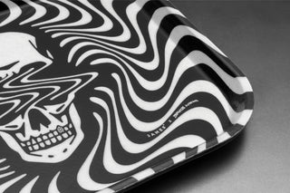 The Bryce Wong artist series cambro tray on a steel surface.