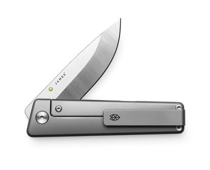The Chapter 2EDC frame lock titanium folding pocket knife with the clip showing.