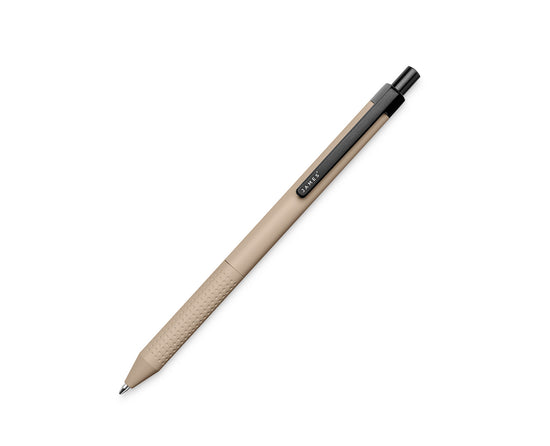 The Burwell EDC click pen in coyote tan and black. 
