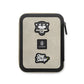 The backside of The Gatecliff travel case in coyote tan and black featuring The "Ranger Eye" patch set.