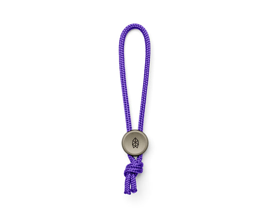 The Ulu EDC bead and lanyard in coyote tan and atomic purple.