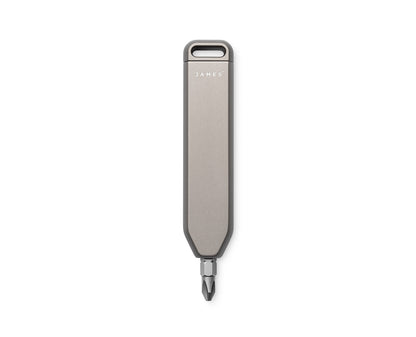 The Warrick EDC screwdriver bit driver in coyote tan open vertically orientated.