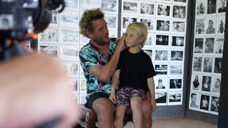 Professional skateboarder and photographer Arto Saari with his son.
