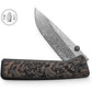The Barnes LTD integral titanium frame lock pocket knife with a Snakesin Copper handle and Damasteel blade.
