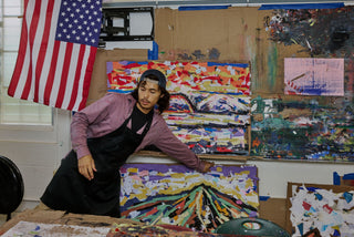 The art teacher of Kahuku elementary school organizing student projects.