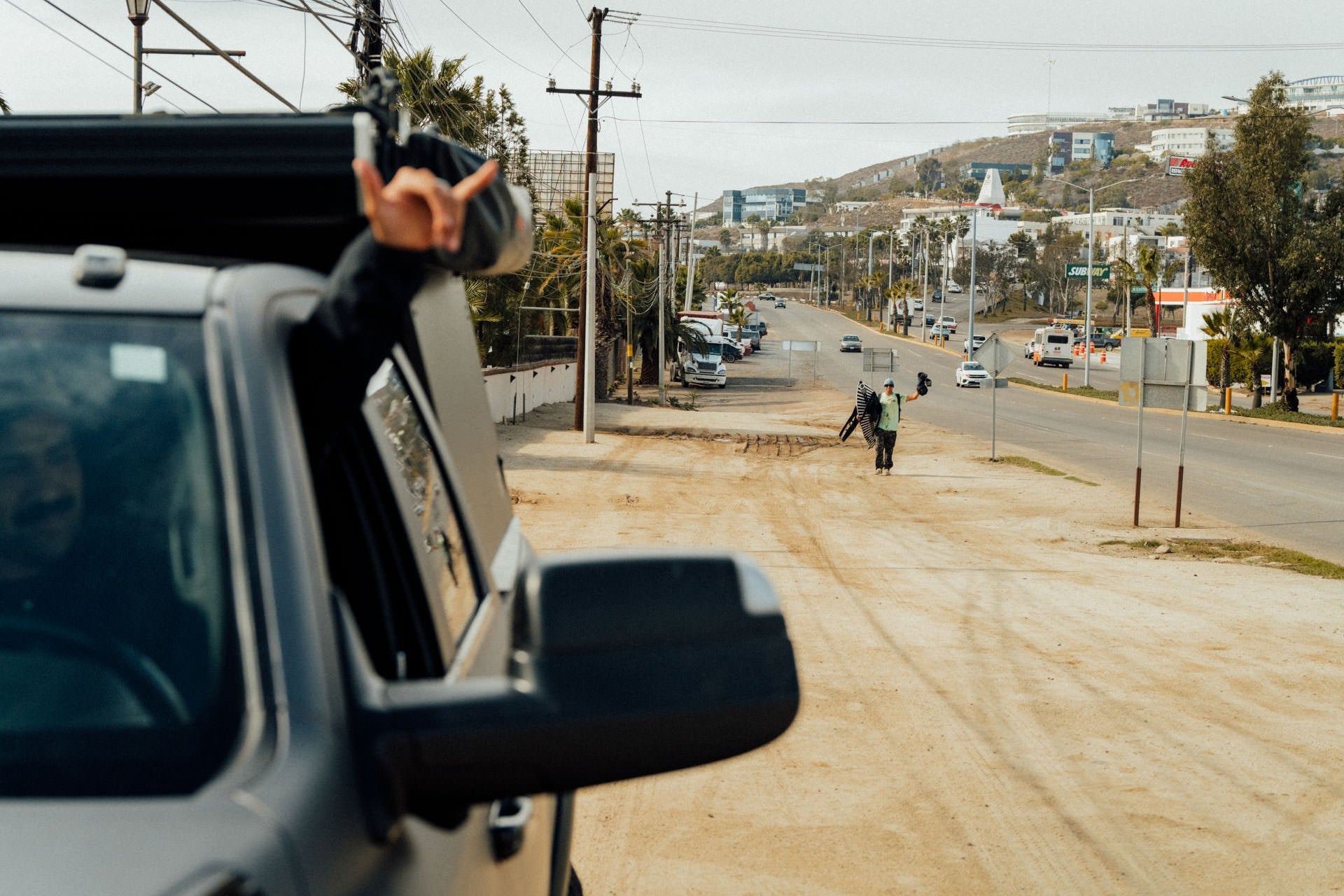 The crew picking up Baja Koala from the side of the road in Baja, Mexico.