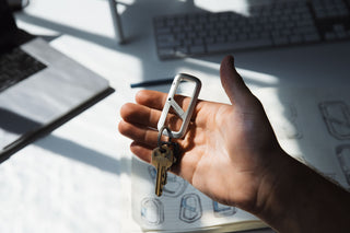 The Madison carabiner resting in hand.