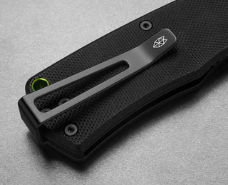 The clip of The Folsom EDC liner lock folding pocket knife with a black handle.