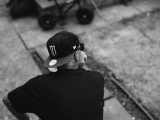 Professional barber Paul Hewitt hanging out on the street.
