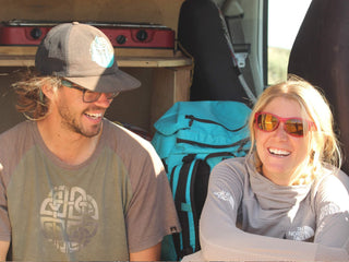 Professional rock climber and photographer Savannah Cummins hanging with her boyfriend in the van.