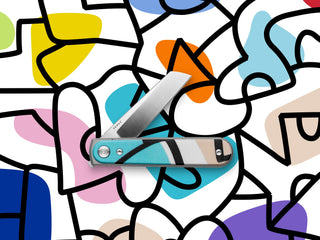 A Duval classic flipper knife with Artist Sebo Walker's artwork on the scales.