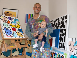 Artist Sebo Walker only his son in his art studio.